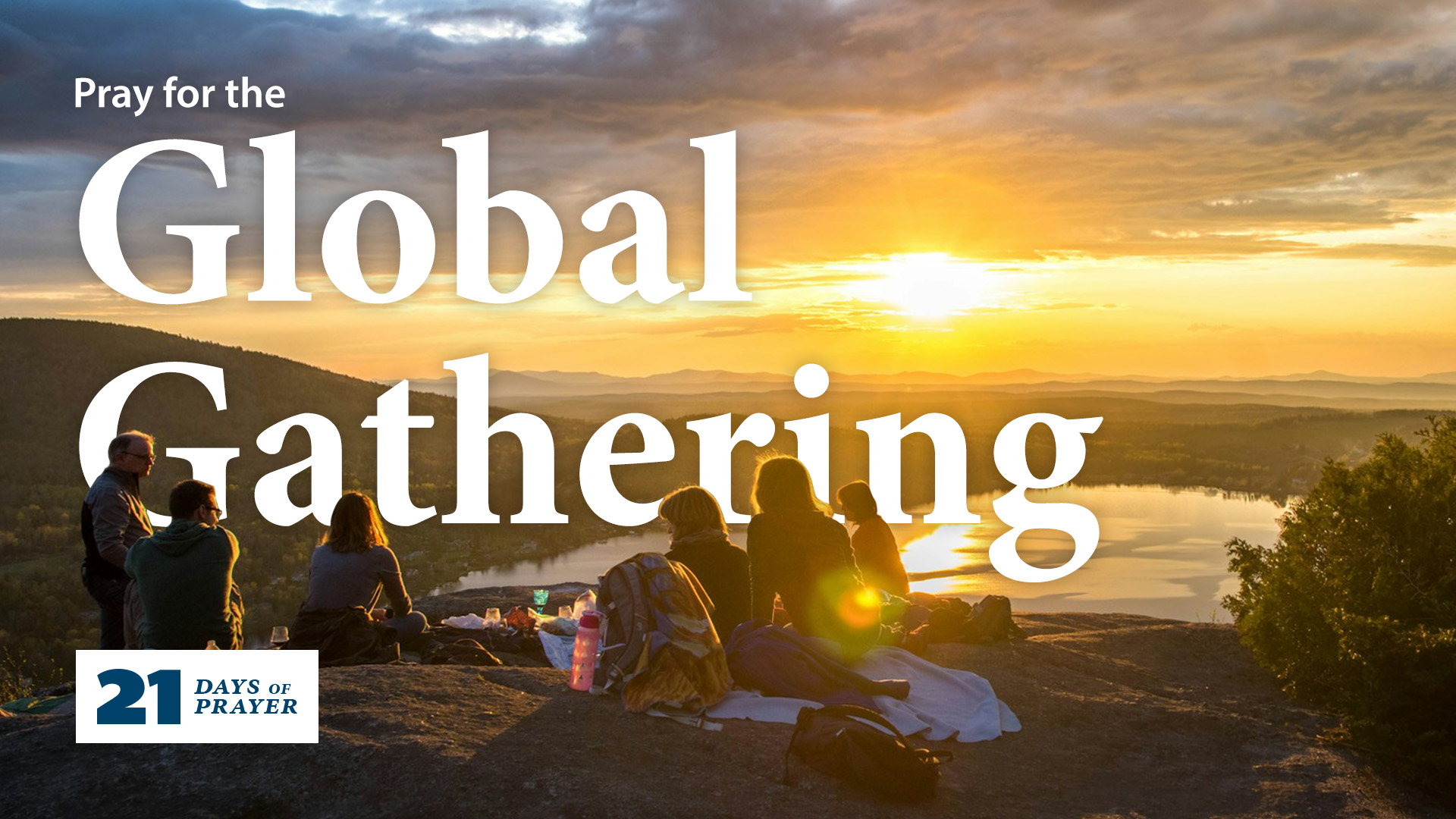 A group of people on a mountain summit watching the sun rise. The text reads 
