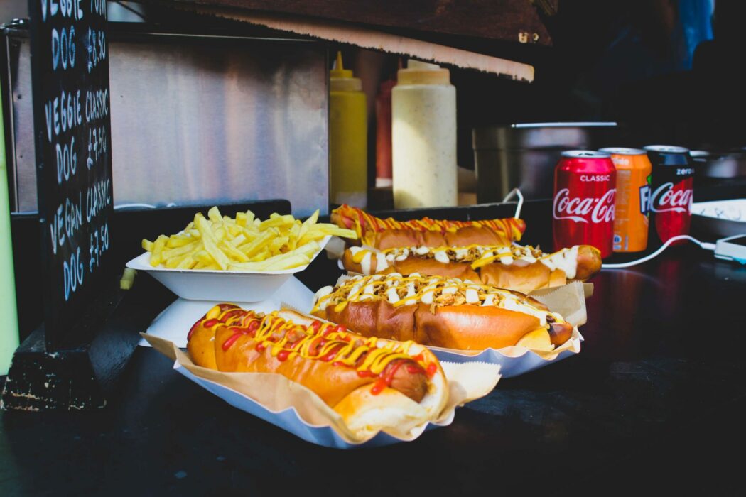 Hot dogs, french fries, and soda.